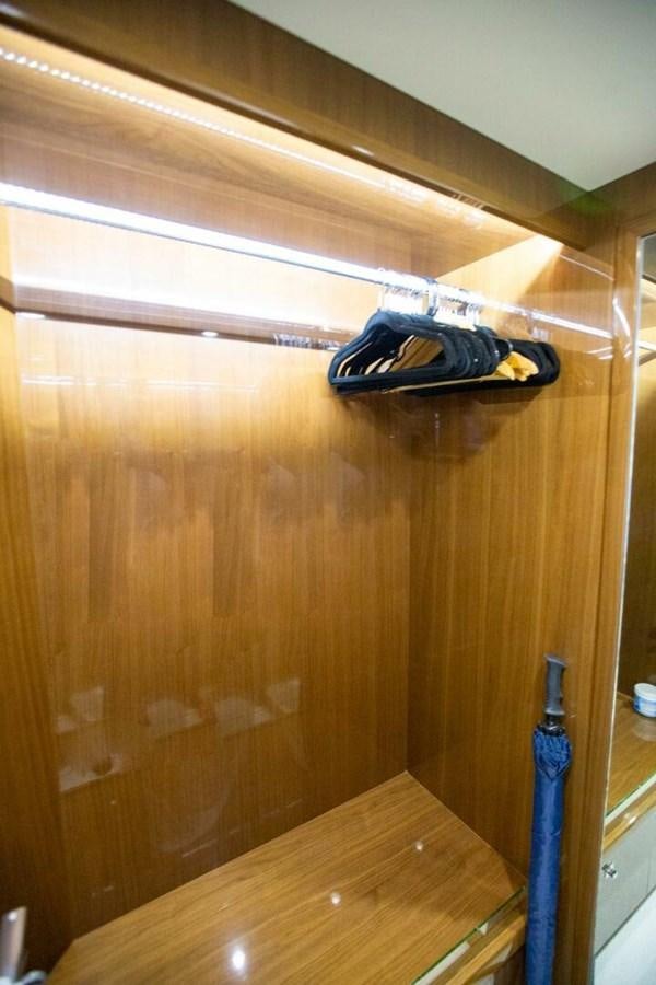 a pair of shoes on a wood floor aboard ENTOURAGE Yacht for Sale