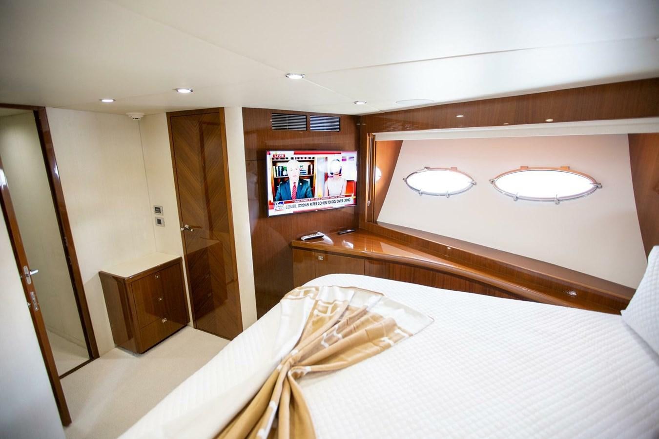 a bed in a room aboard ENTOURAGE Yacht for Sale