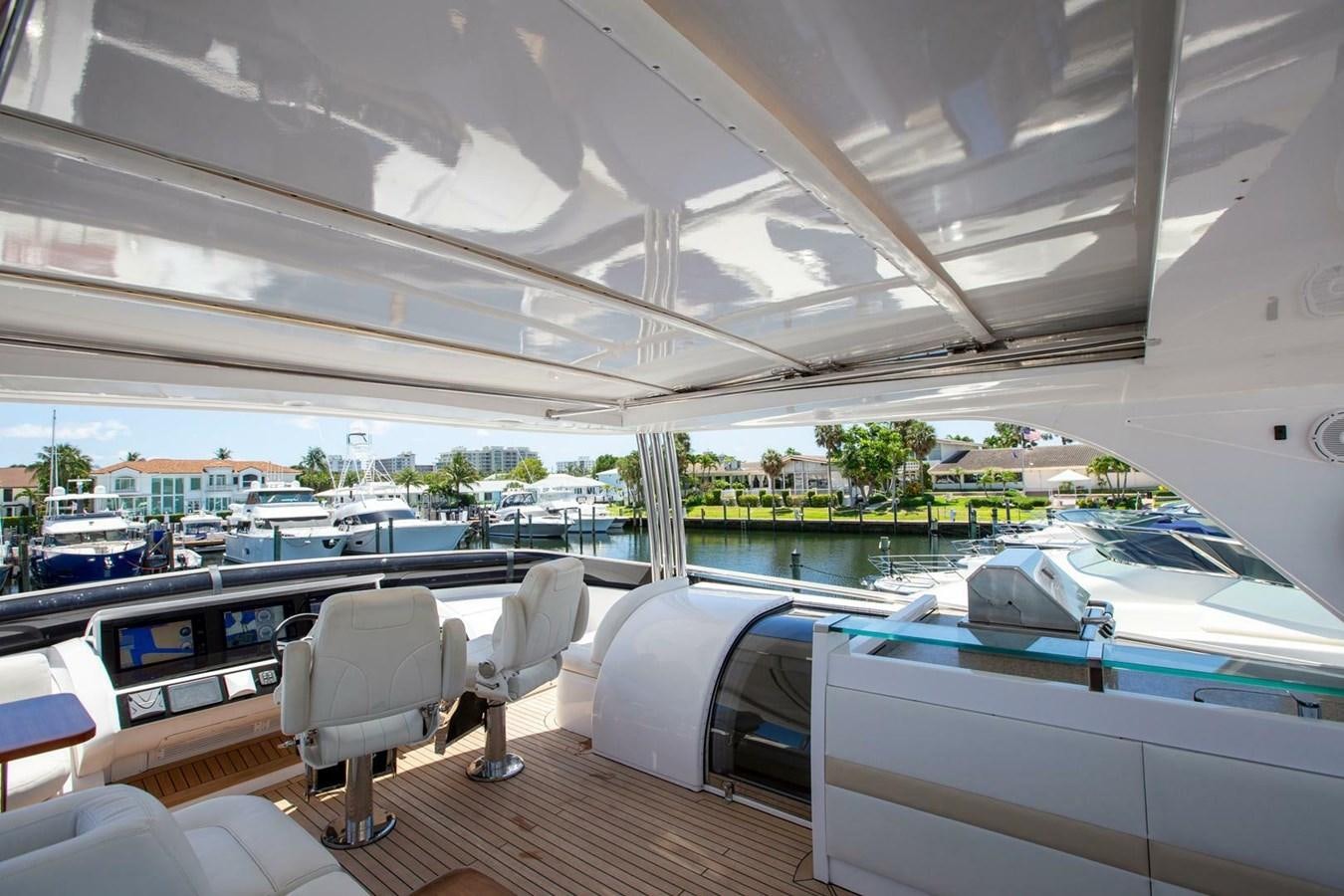 a room with a view of a city and a large window aboard ENTOURAGE Yacht for Sale