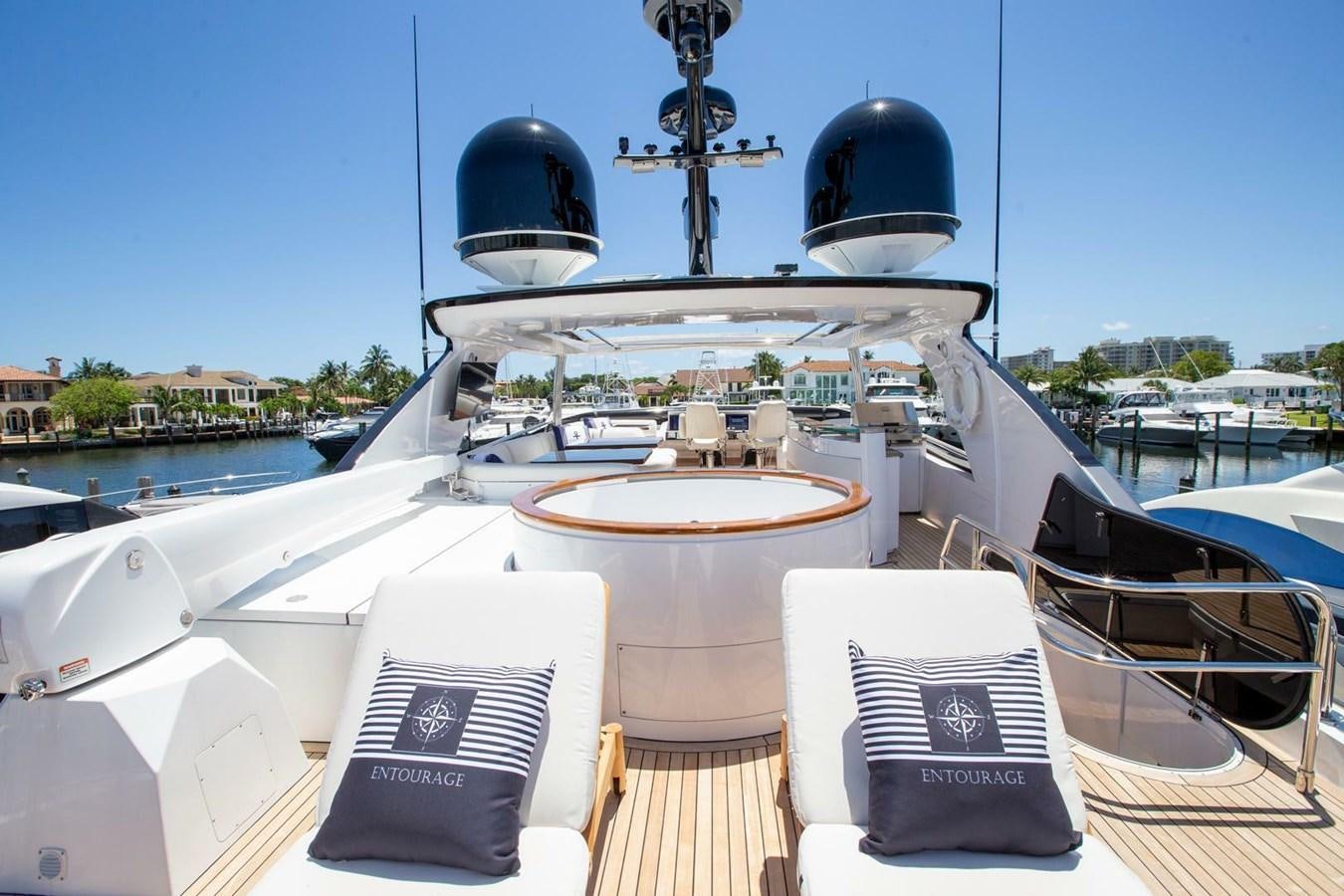 a boat with a round top and a round top on the front aboard ENTOURAGE Yacht for Sale