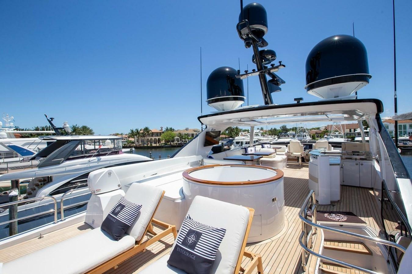 a boat with a satellite dish on the deck aboard ENTOURAGE Yacht for Sale