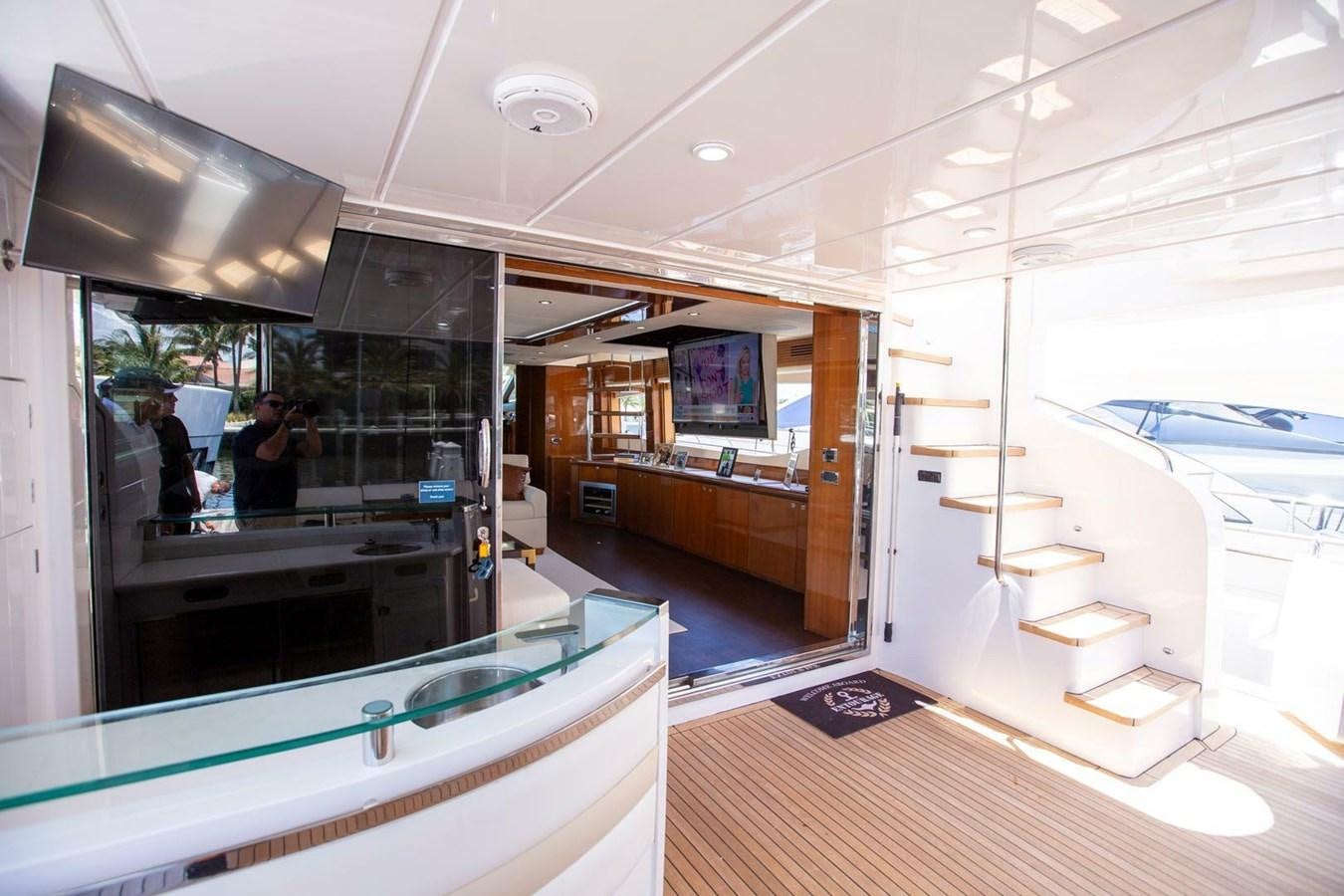 a room with a staircase and a glass door aboard ENTOURAGE Yacht for Sale