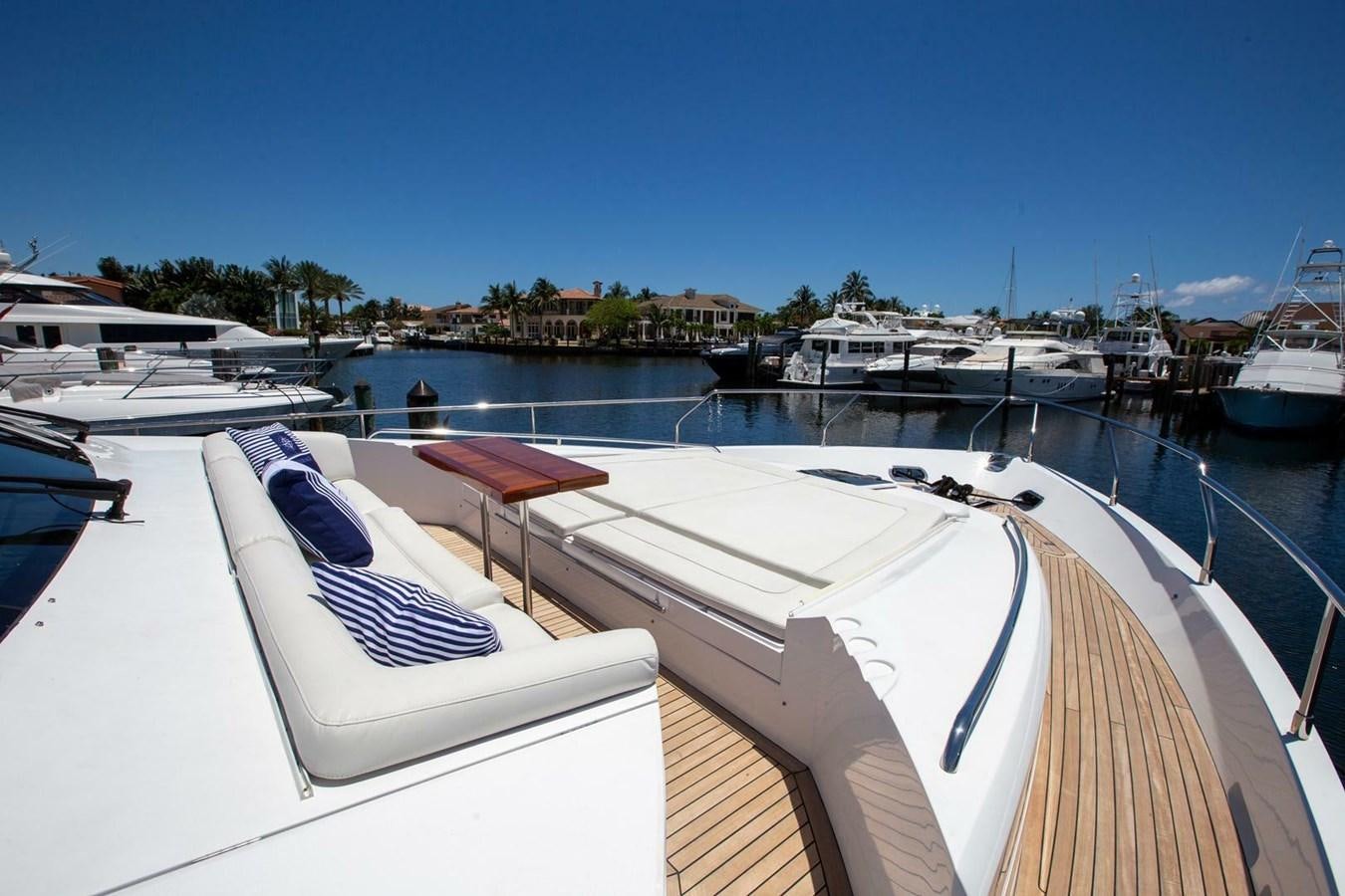 a boat in a harbor aboard ENTOURAGE Yacht for Sale
