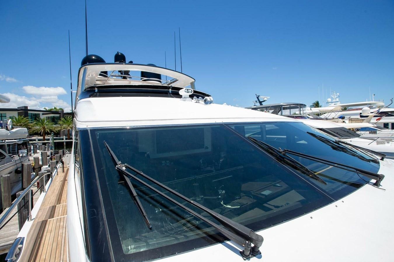 a yacht parked in a marina aboard ENTOURAGE Yacht for Sale