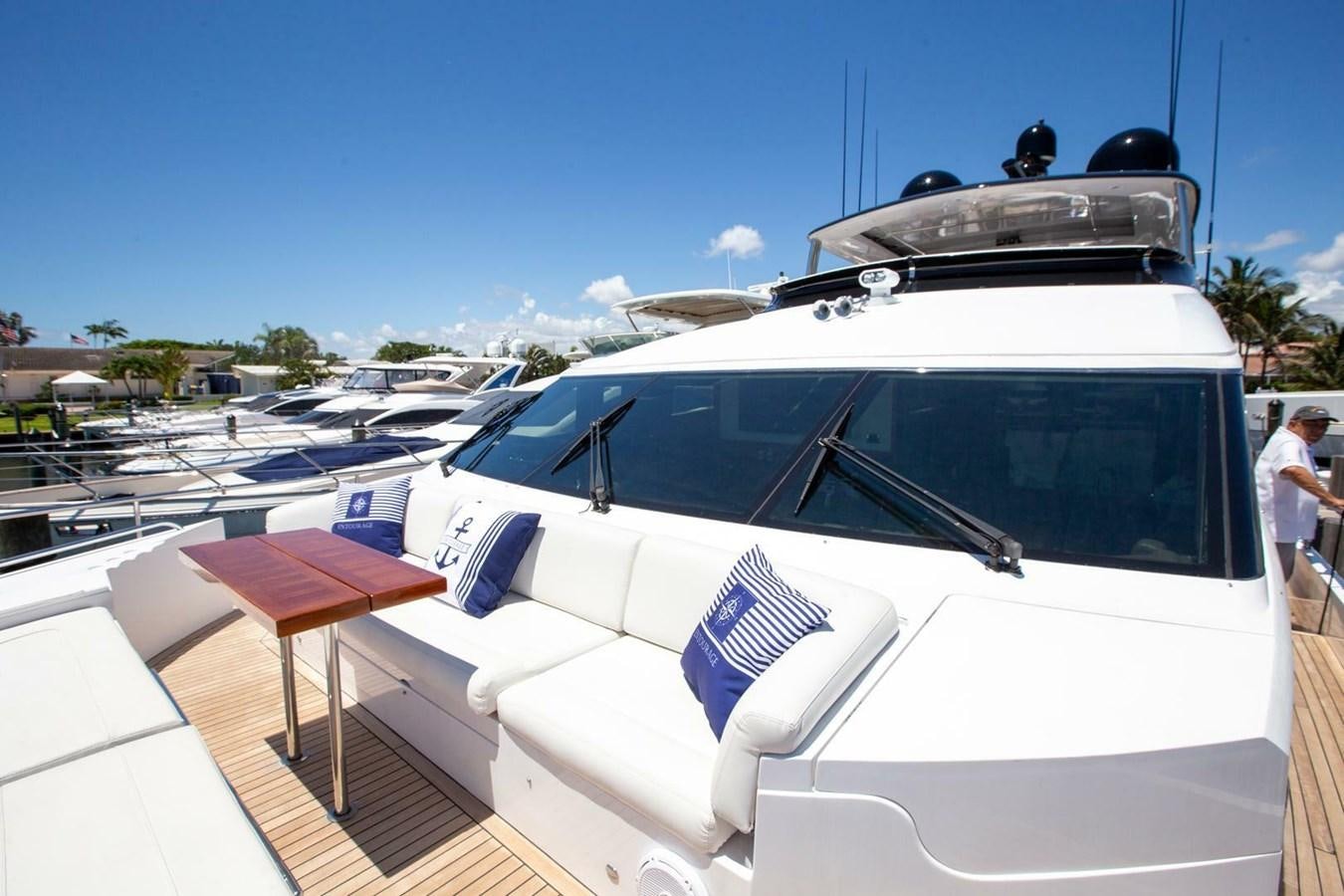 a white car with a roof aboard ENTOURAGE Yacht for Sale