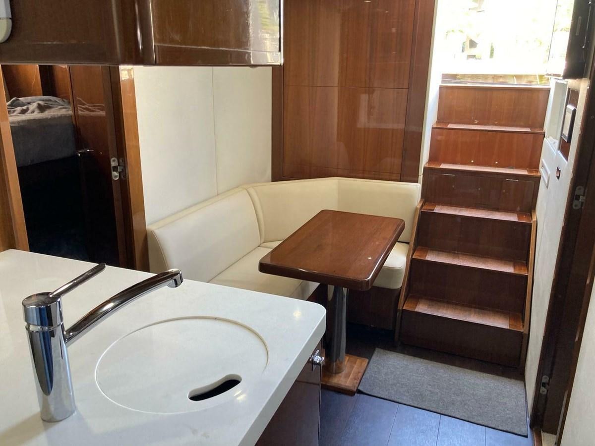 a bathroom with a sink and a toilet aboard ENTOURAGE Yacht for Sale