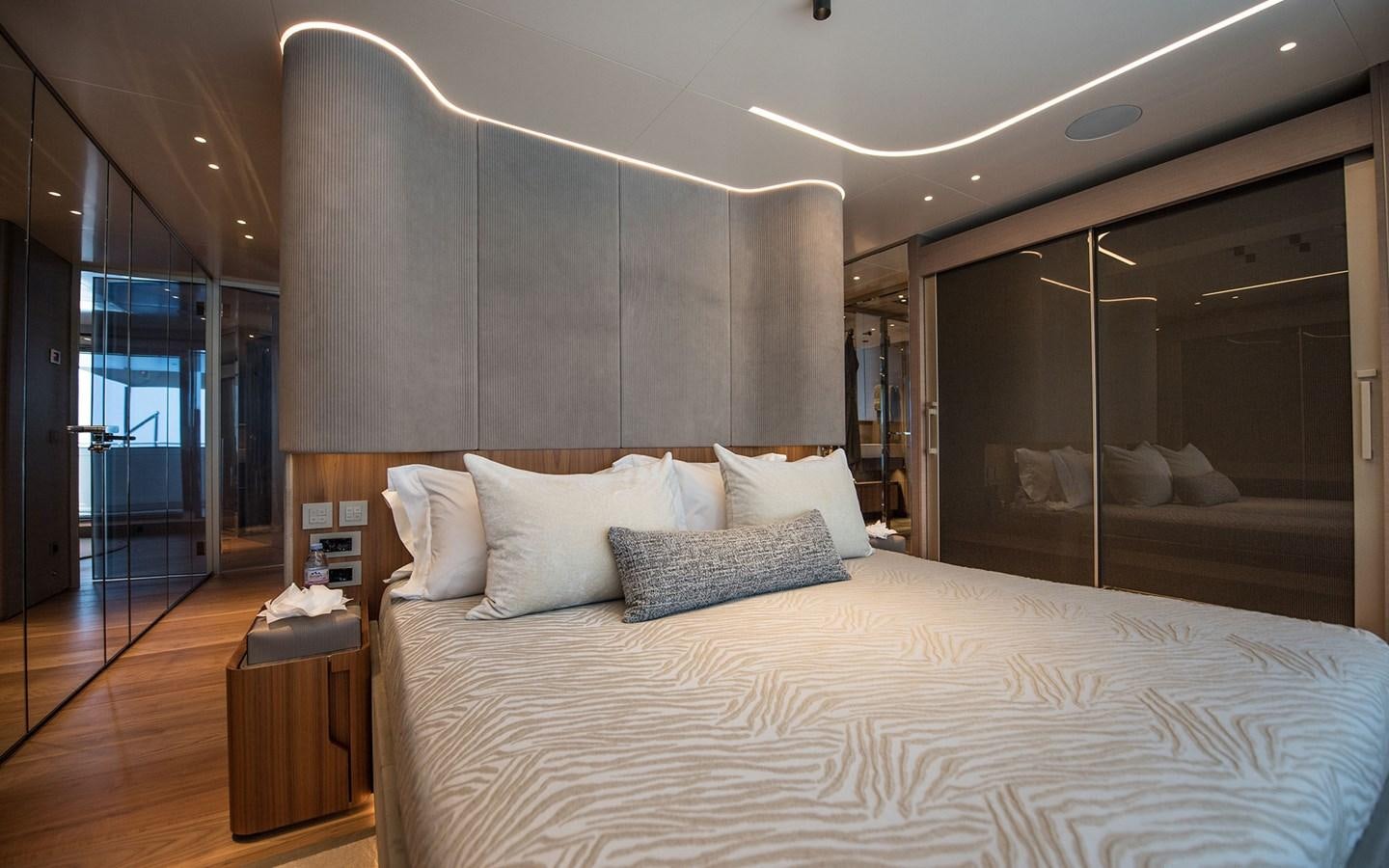 a large bed in a room aboard FLORENTIA Yacht for Sale