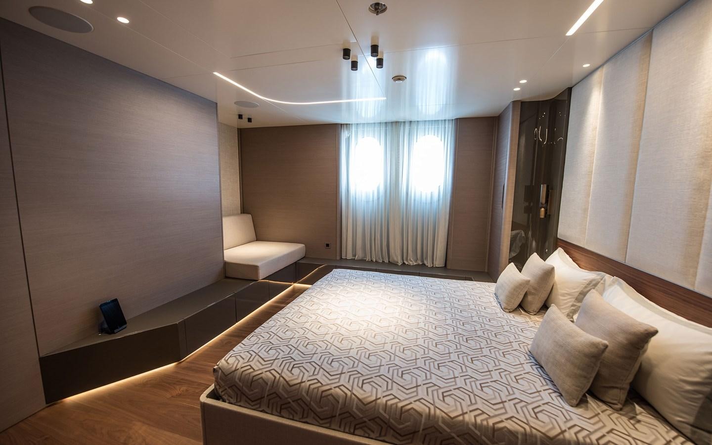 a large bed in a room aboard FLORENTIA Yacht for Sale