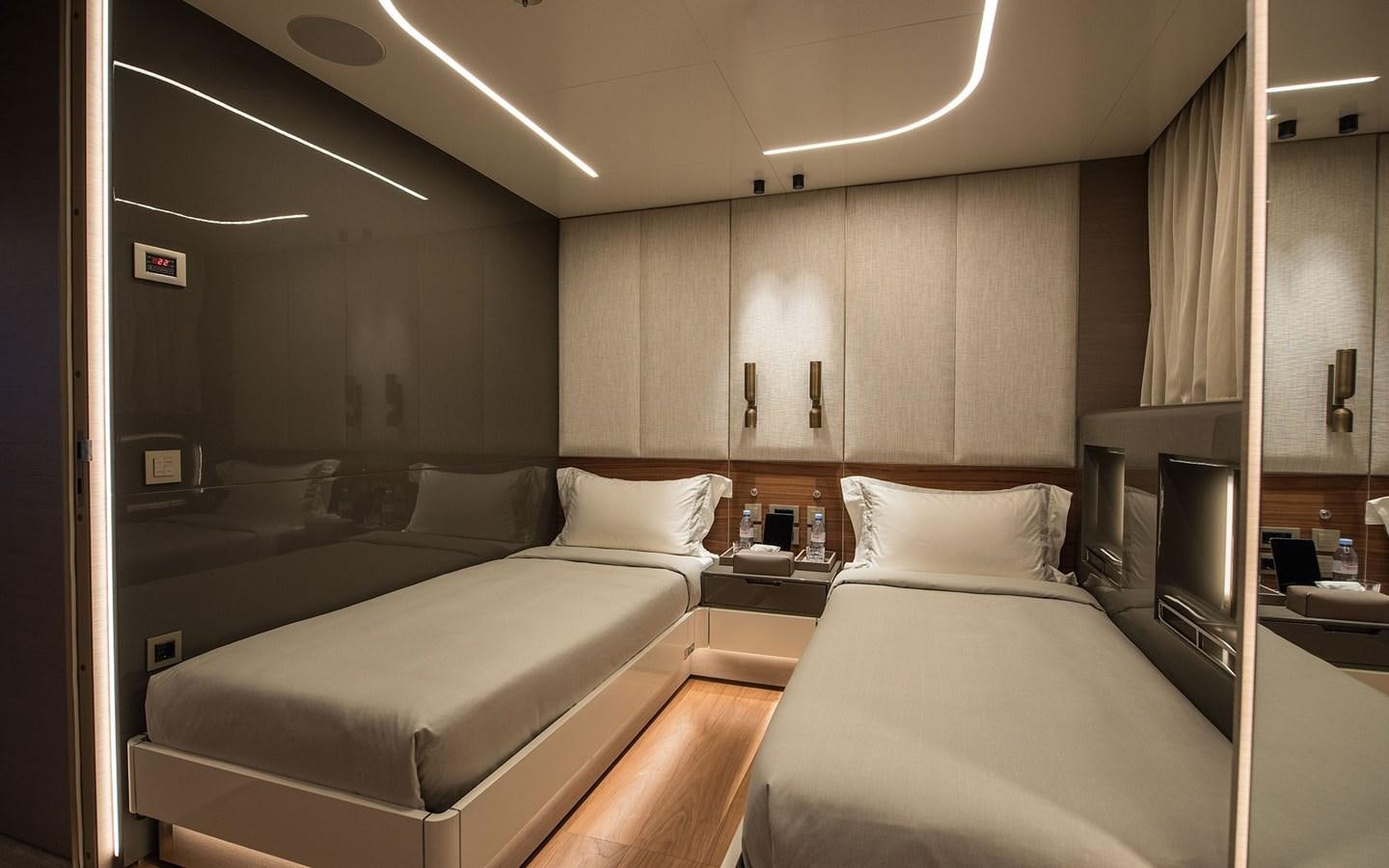 a room with two beds aboard FLORENTIA Yacht for Sale