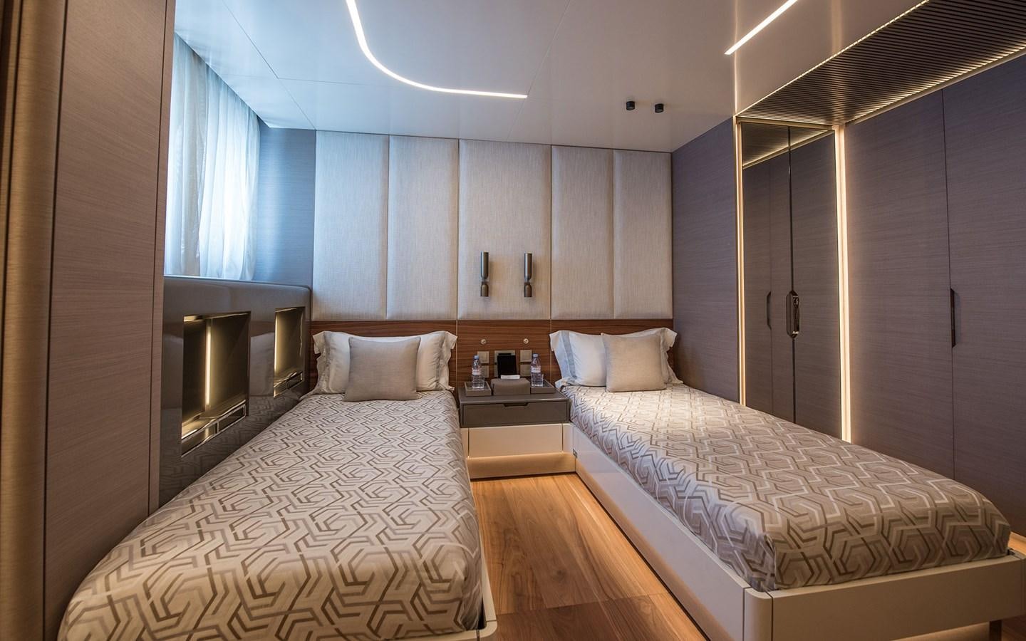 a room with two beds aboard FLORENTIA Yacht for Sale