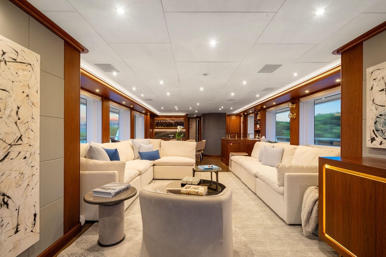 a living room with a couch and a table aboard 2017 CANTIERE DELLE MARCHE DARWIN/ATLAS Yacht for Sale