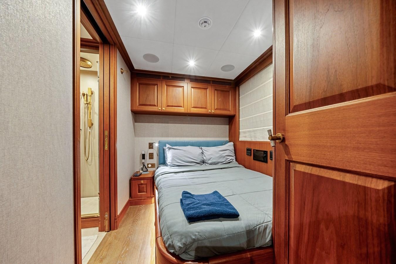 a bedroom with a bed and a closet aboard 2017 CANTIERE DELLE MARCHE DARWIN/ATLAS Yacht for Sale