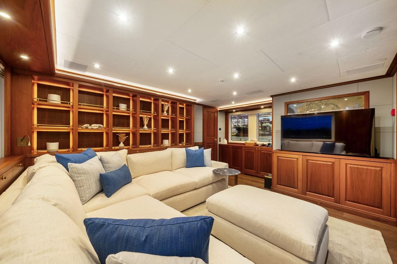 a living room with a couch and a tv aboard 2017 CANTIERE DELLE MARCHE DARWIN/ATLAS Yacht for Sale