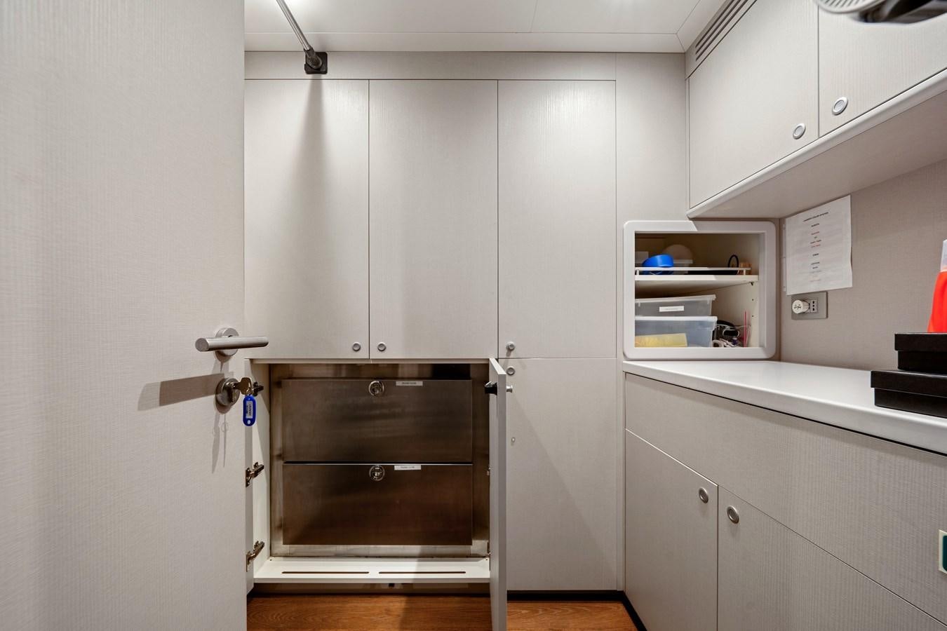 a kitchen with a stove and cabinets aboard 2017 CANTIERE DELLE MARCHE DARWIN/ATLAS Yacht for Sale