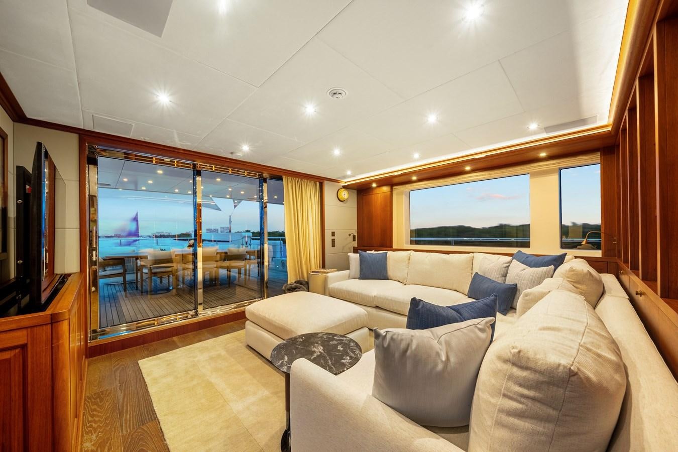 a living room with a large window aboard 2017 CANTIERE DELLE MARCHE DARWIN/ATLAS Yacht for Sale