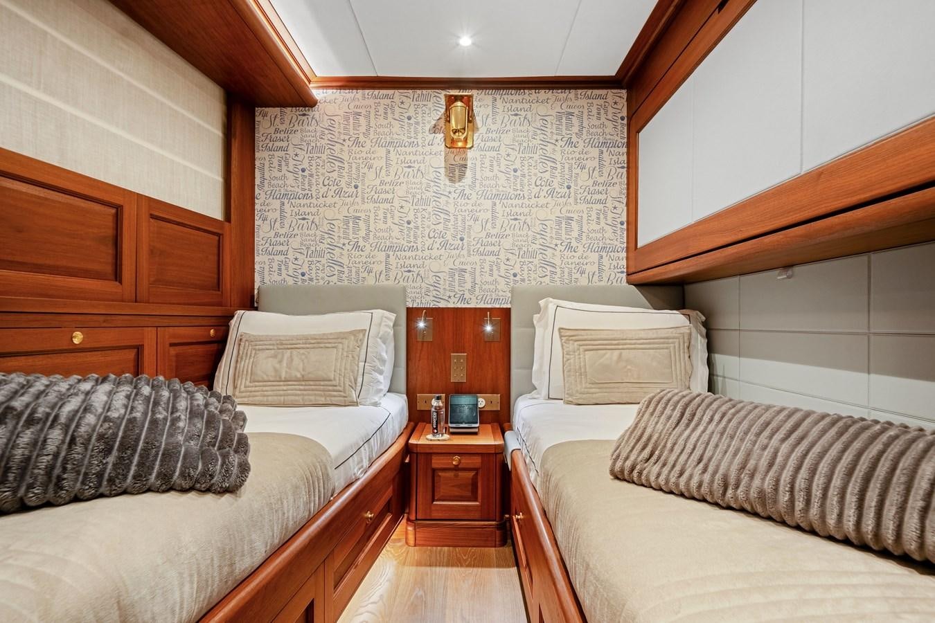a bedroom with a bed and a dresser aboard 2017 CANTIERE DELLE MARCHE DARWIN/ATLAS Yacht for Sale