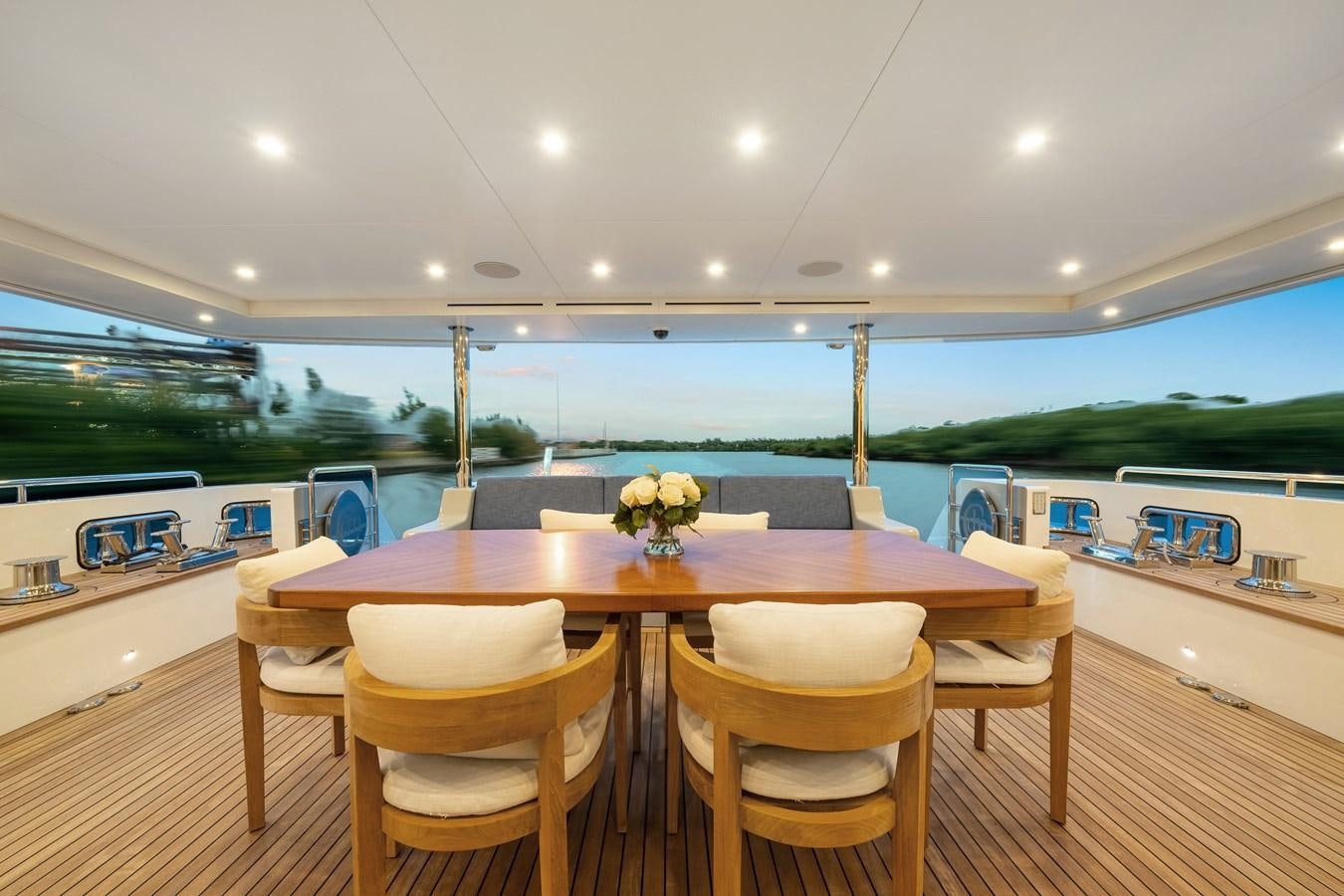a large kitchen with a table and chairs aboard 2017 CANTIERE DELLE MARCHE DARWIN/ATLAS Yacht for Sale