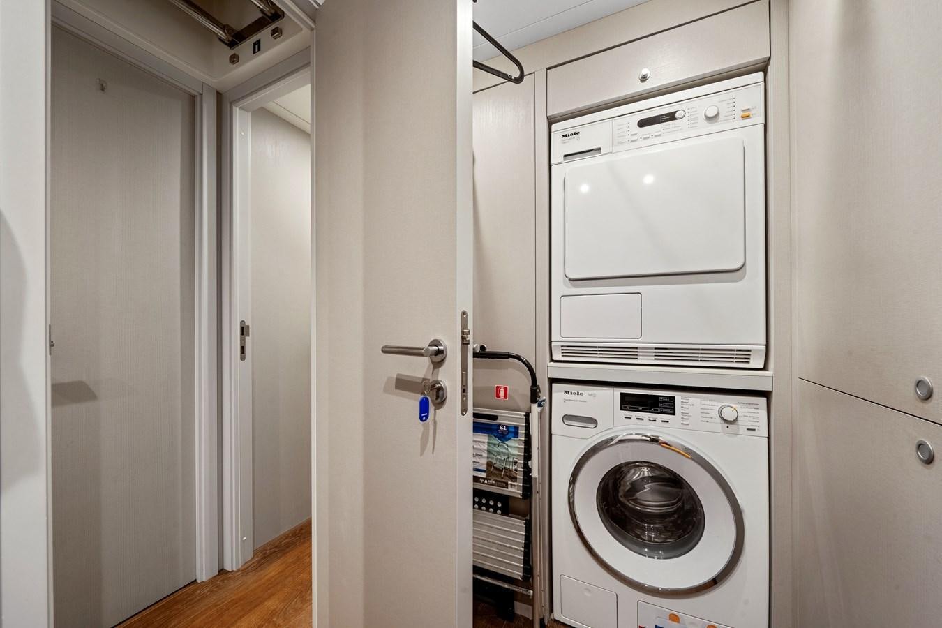 a room with white cabinets and a washing machine aboard 2017 CANTIERE DELLE MARCHE DARWIN/ATLAS Yacht for Sale