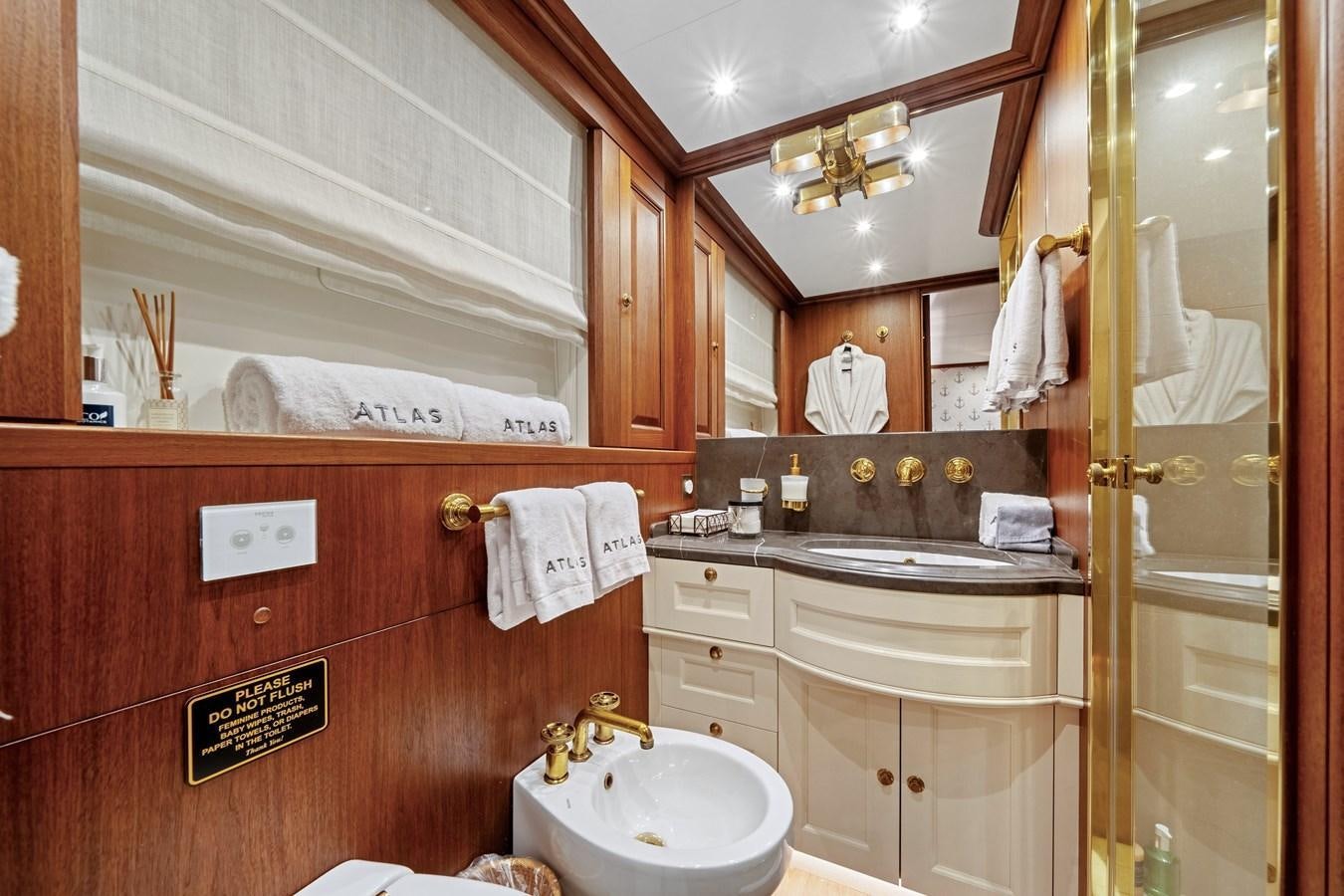 a bathroom with a sink and a mirror aboard 2017 CANTIERE DELLE MARCHE DARWIN/ATLAS Yacht for Sale