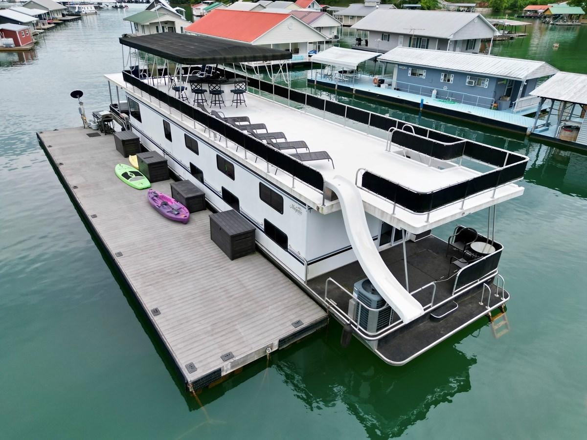 a model of a boat aboard 2012 MAJESTIC 16 X 75WB HOUSEBOAT NLSD Yacht for Sale