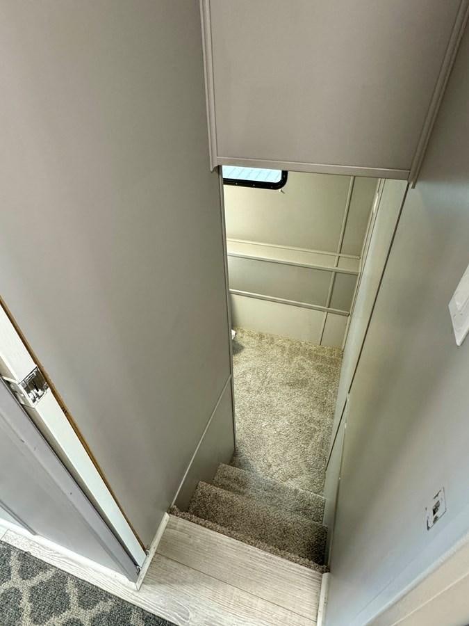 a hallway with a carpet aboard 2012 MAJESTIC 16 X 75WB HOUSEBOAT NLSD Yacht for Sale