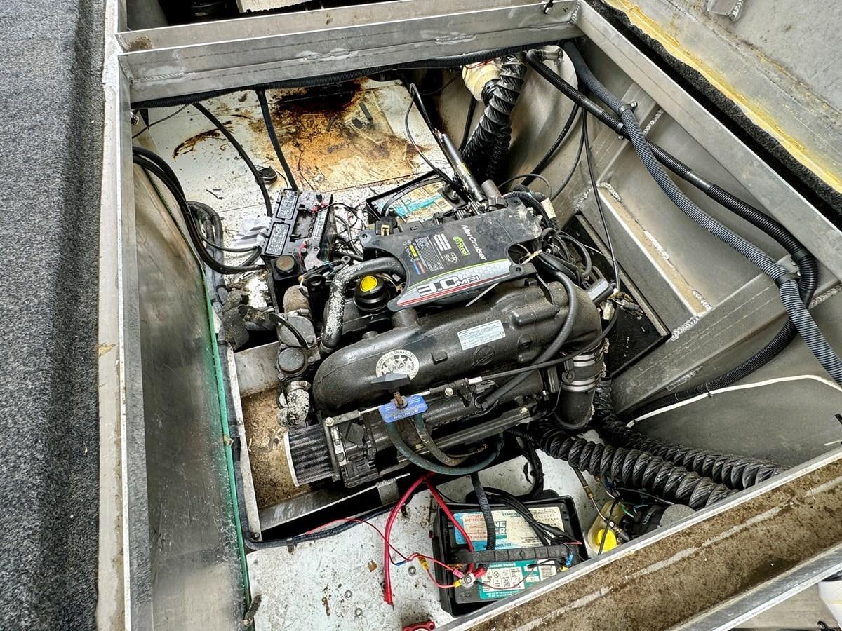 a car engine with wires aboard 2012 MAJESTIC 16 X 75WB HOUSEBOAT NLSD Yacht for Sale
