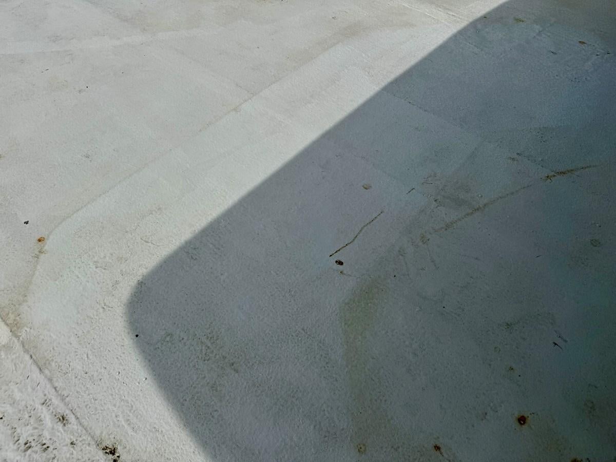 a close-up of a concrete surface aboard 2012 MAJESTIC 16 X 75WB HOUSEBOAT NLSD Yacht for Sale