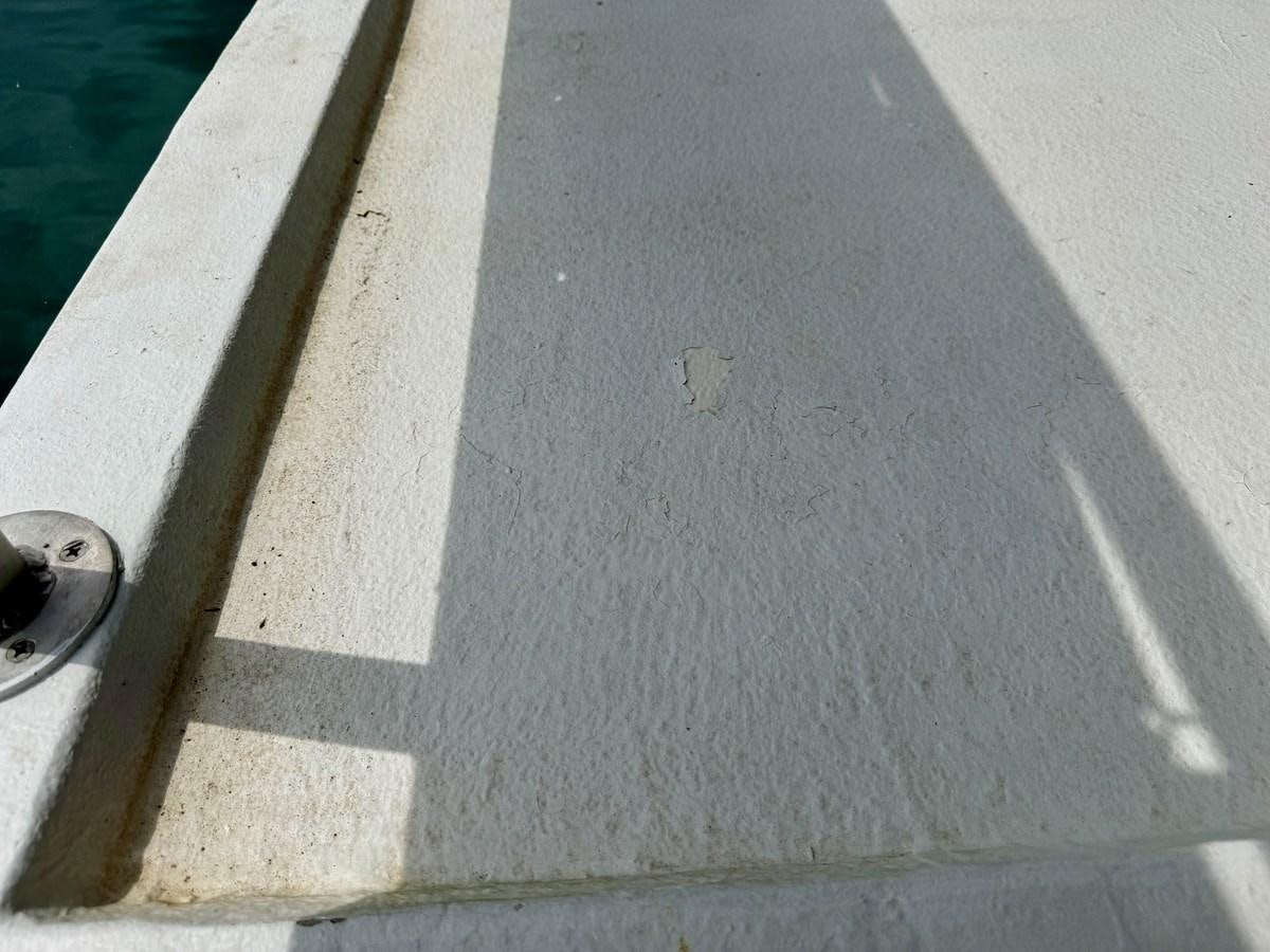 a close-up of a white tile floor aboard 2012 MAJESTIC 16 X 75WB HOUSEBOAT NLSD Yacht for Sale