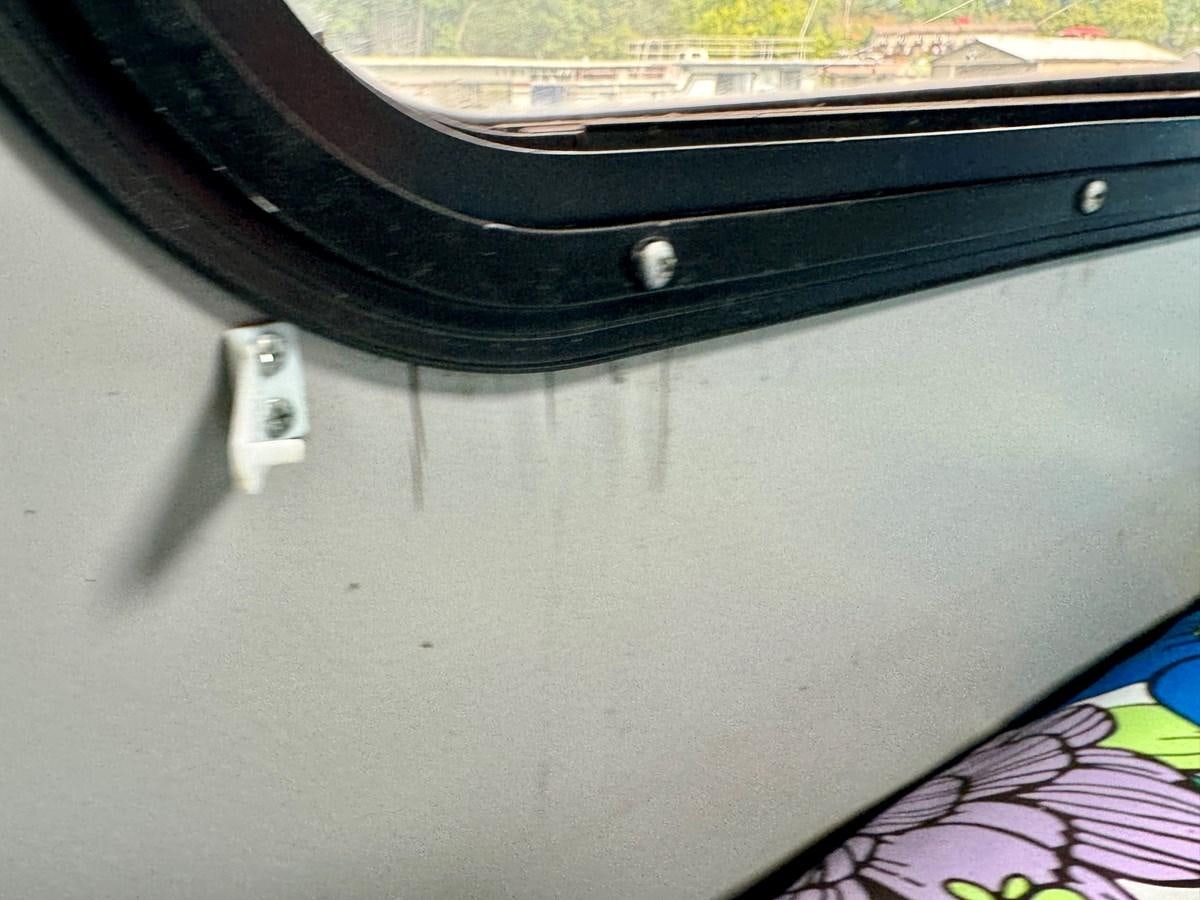 a close-up of a black device aboard 2012 MAJESTIC 16 X 75WB HOUSEBOAT NLSD Yacht for Sale