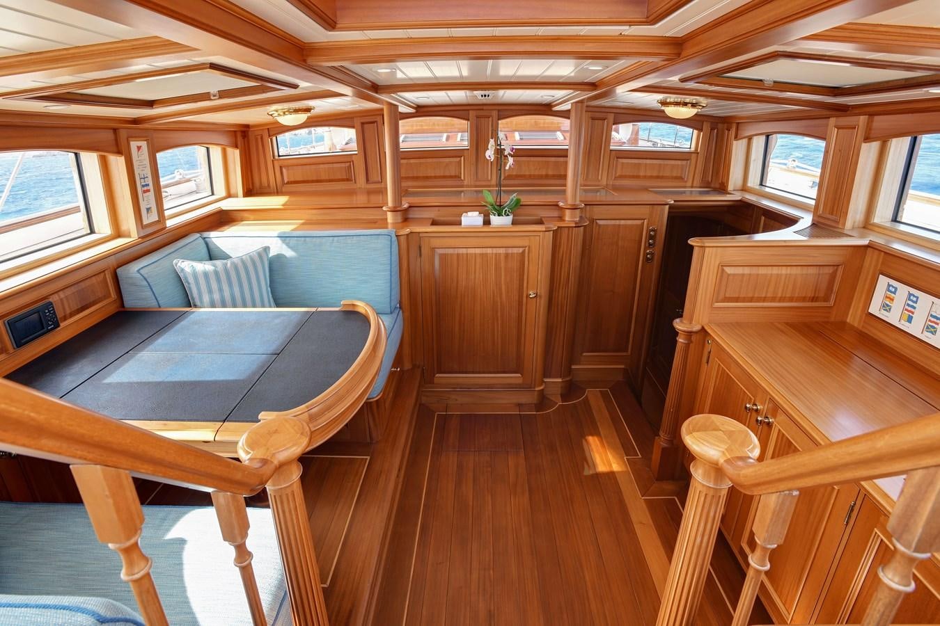 a room with a table and chairs aboard ANNE Yacht for Sale