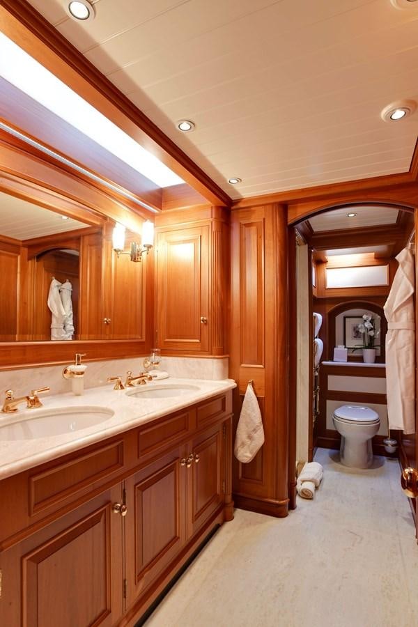 a bathroom with a large mirror aboard ANNE Yacht for Sale