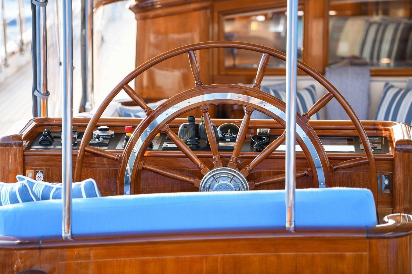 a wooden steering wheel aboard ANNE Yacht for Sale