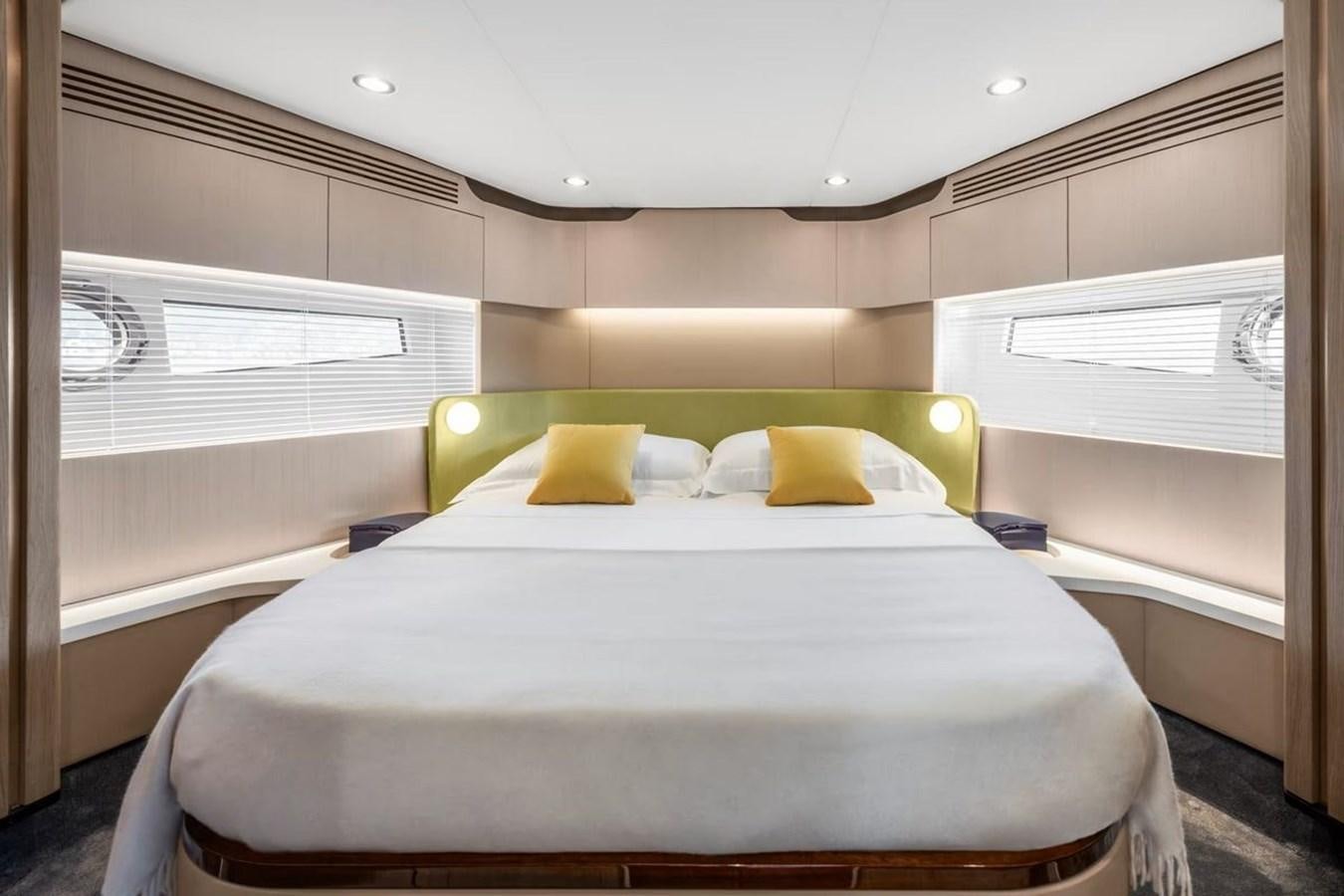 a bed with a white bed aboard 2023 AZIMUT FLY 78/56 Yacht for Sale