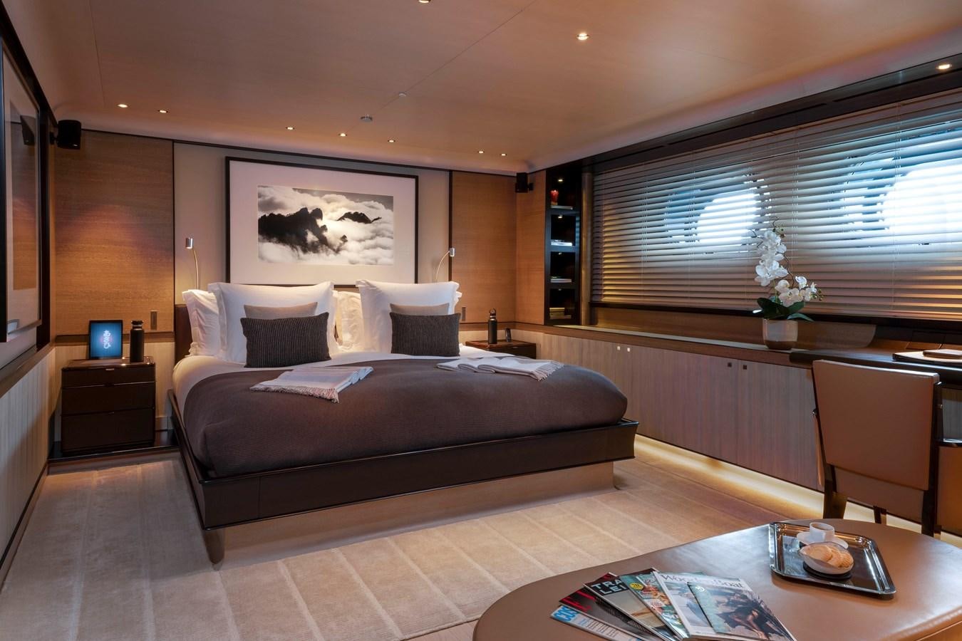 a large bedroom with a bed aboard ASAHI Yacht for Sale