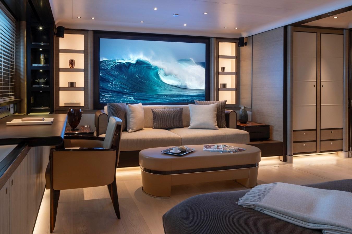 a living room with a large screen aboard ASAHI Yacht for Sale