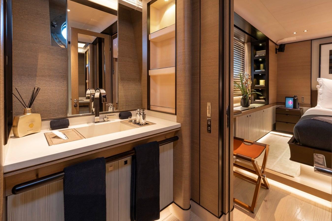 a bathroom with a sink and a mirror aboard ASAHI Yacht for Sale