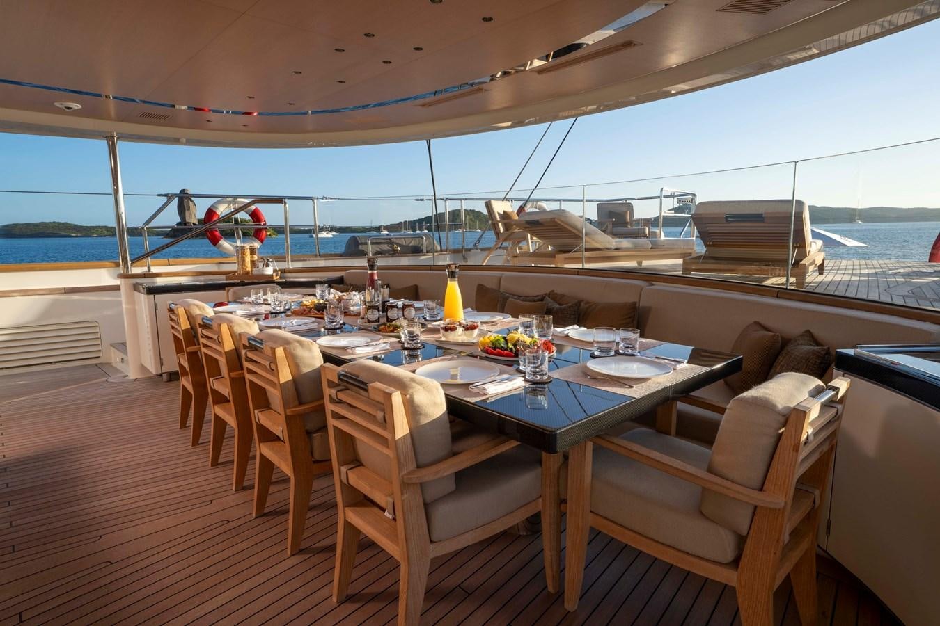 a table set for a meal aboard ASAHI Yacht for Sale