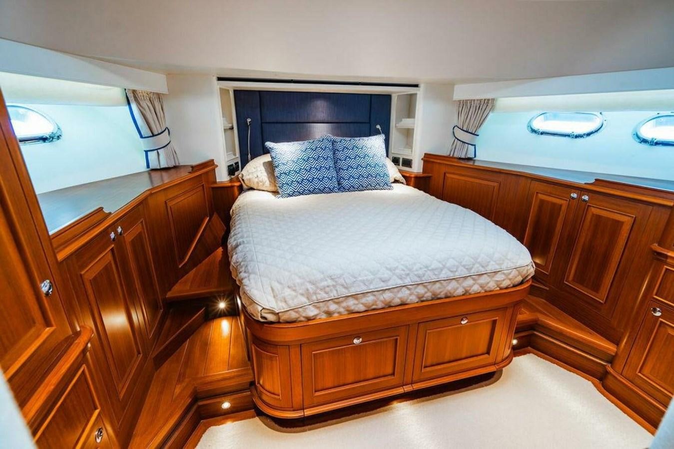 a bed in a room aboard PHOEBE Yacht for Sale