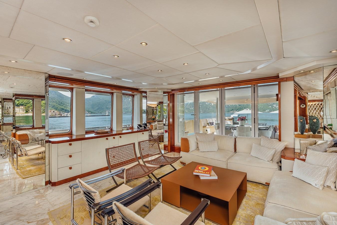 a living room with a large window aboard ZULU Yacht for Sale