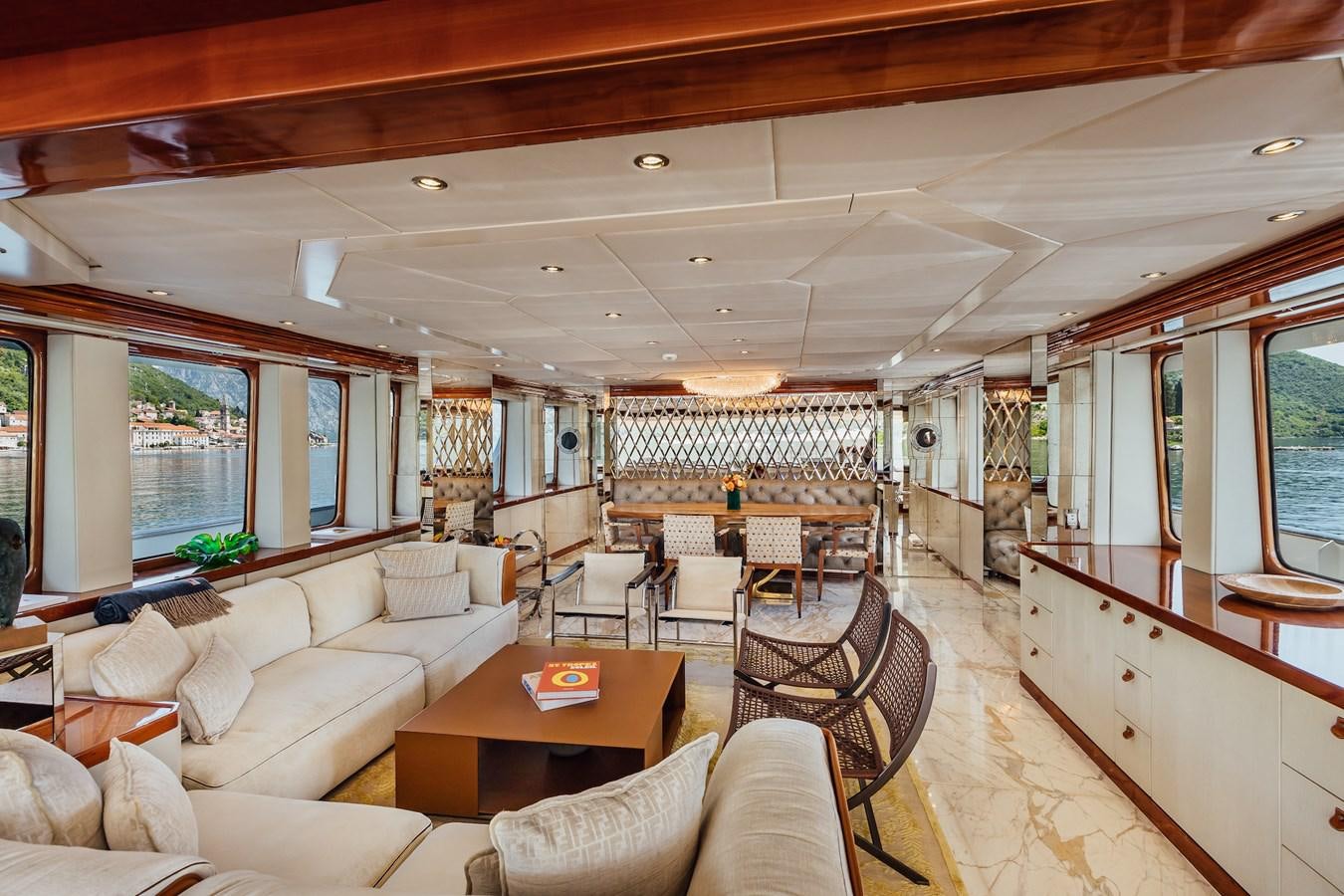 a living room with a large window aboard ZULU Yacht for Sale