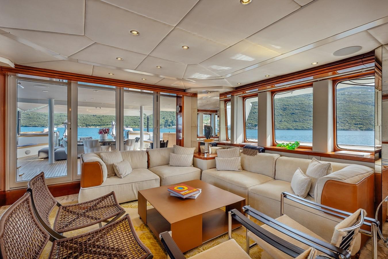 a living room with a large window aboard ZULU Yacht for Sale