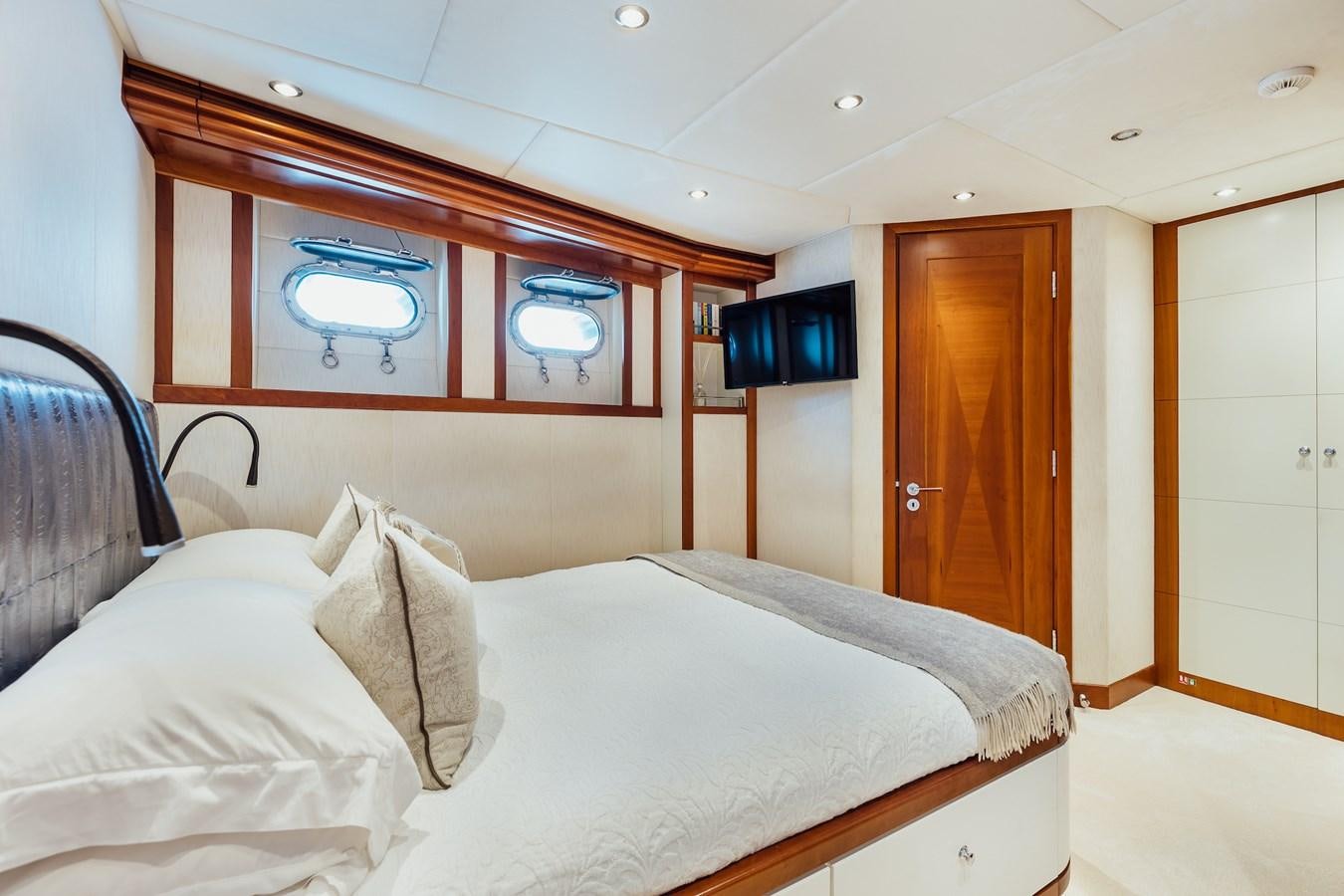 a room with two beds aboard ZULU Yacht for Sale