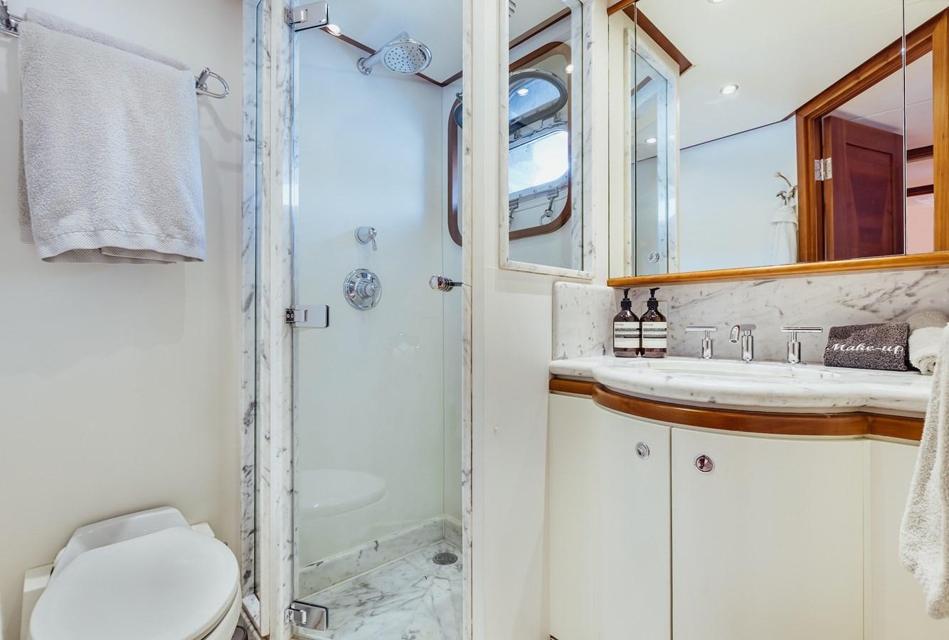 a bathroom with a sink and a mirror aboard ZULU Yacht for Sale