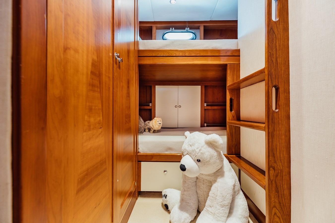 a white stuffed animal in a room aboard ZULU Yacht for Sale