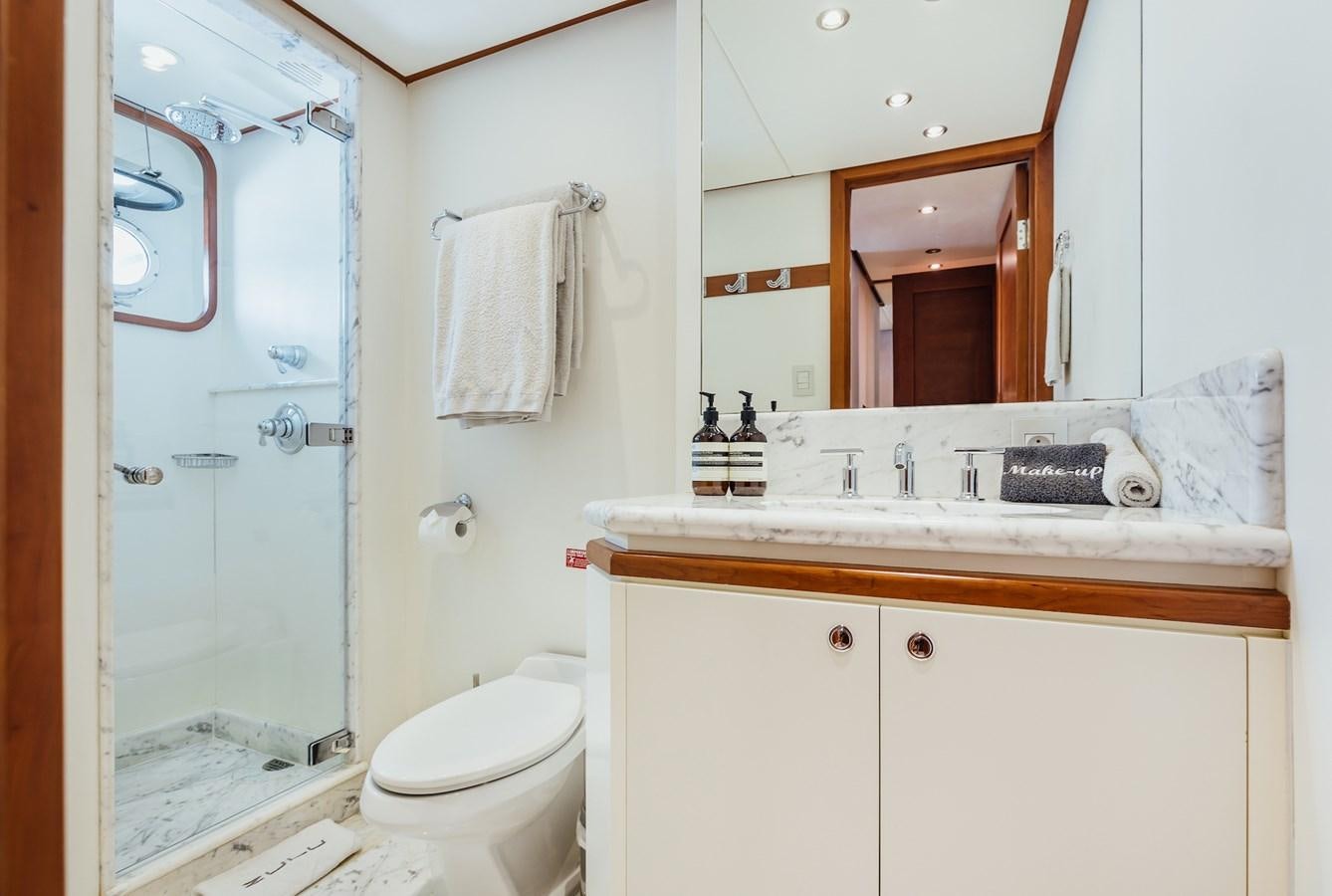 a bathroom with a sink and toilet aboard ZULU Yacht for Sale