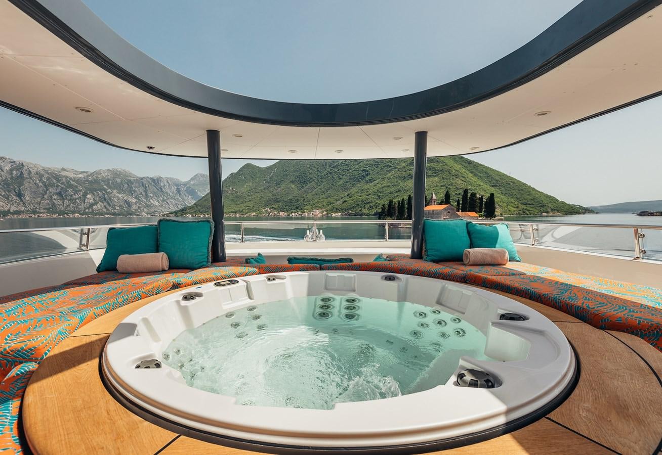 a swimming pool on a deck aboard ZULU Yacht for Sale