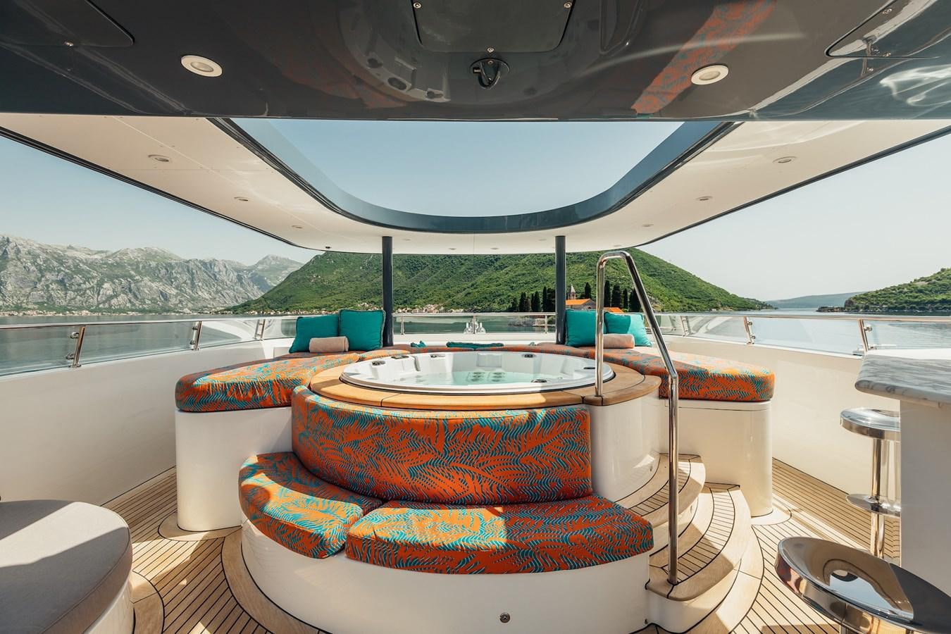 a boat on a deck aboard ZULU Yacht for Sale