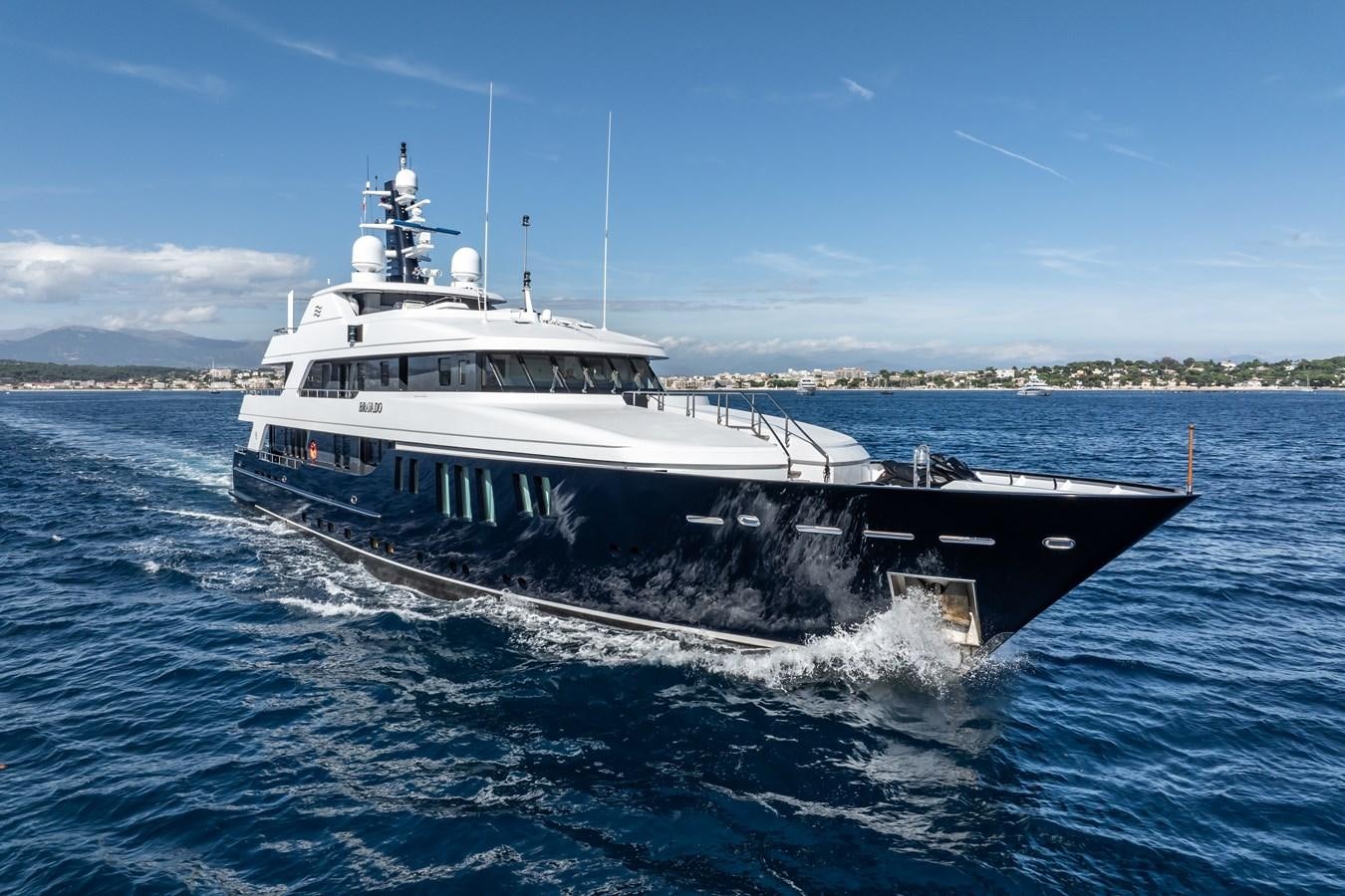 a large ship in the water aboard BRAVADO Yacht for Sale