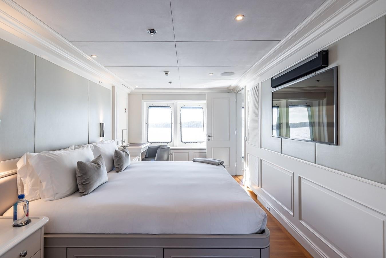 a bed in a room aboard BRAVADO Yacht for Sale
