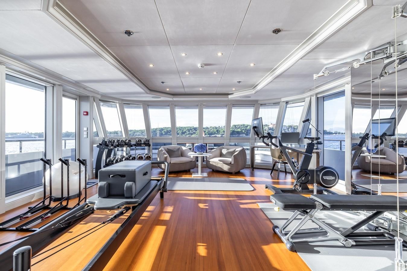 treadmills in a room aboard BRAVADO Yacht for Sale